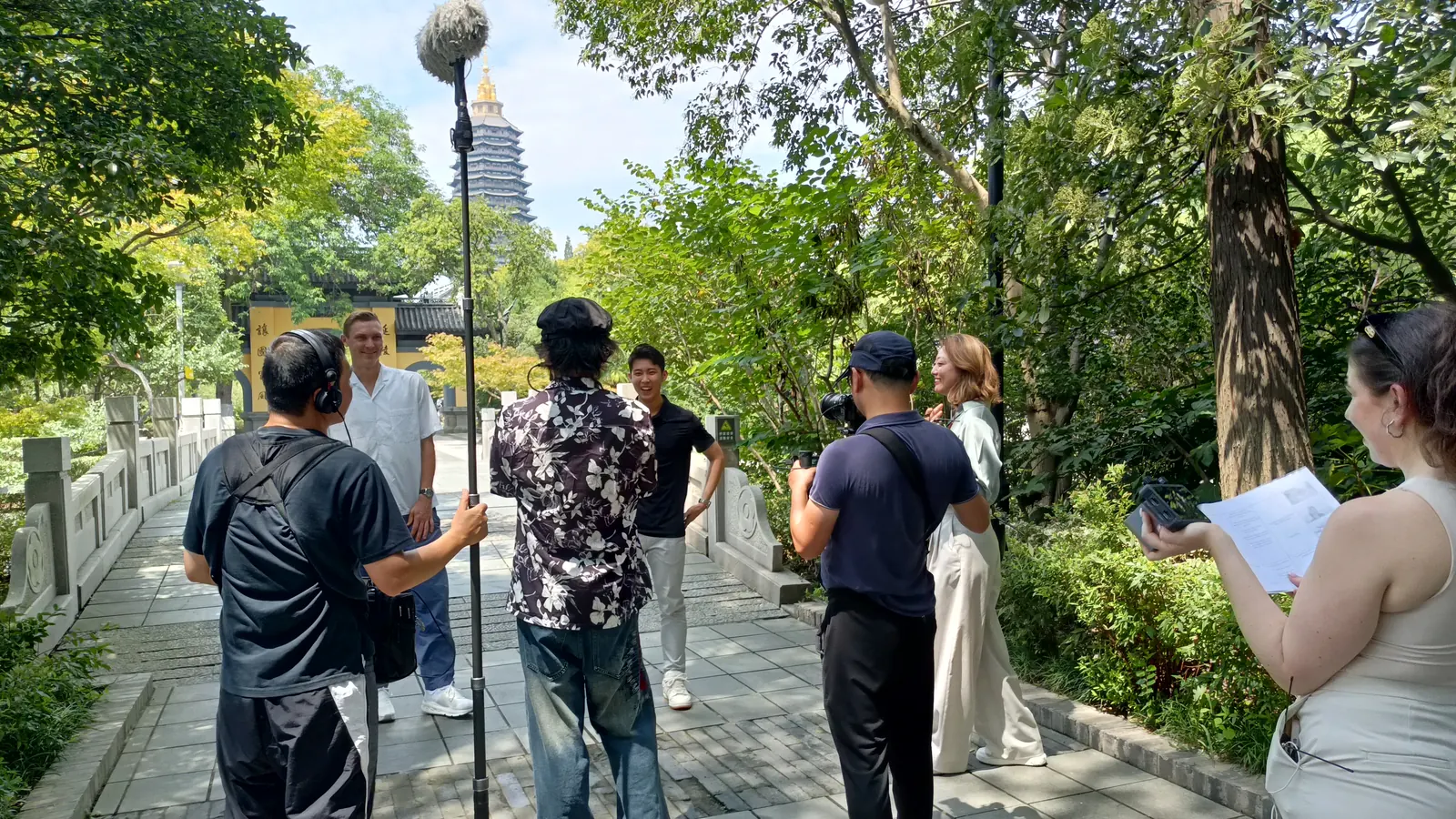 Bilingual video crew filming on location in China